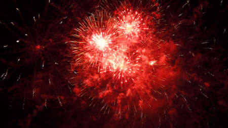 Fireworks Festival Background. Shining Real Fireworks With Bokeh Lights In The Night Sky. Glowing Fireworks Show. New Year's Eve Fireworks Celebration Holiday. Colorful Firework Flashes At Nightの写真素材