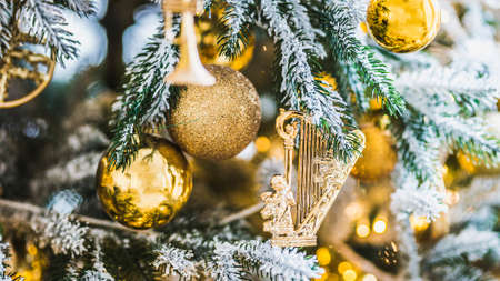 Christmas and New Year interior in light classic style. White room with Xmas Tree decorated,...