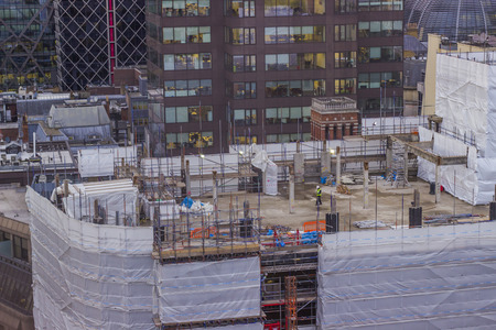 Worker on a rooftop in Londonのeditorial素材