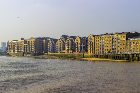 Buildings alongside Thames river in London.のeditorial素材