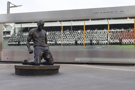 London, United Kingdom - 3 September 2017: View of the statue of Thierry Henry in front of the Arsenal Emirates Football Stadium.のeditorial素材