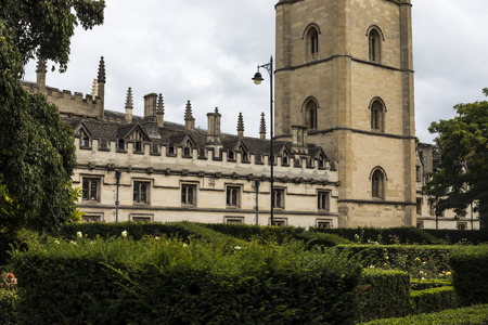 Oxford, United Kingdom - 3 September 2017: Street view in the city of Oxford with tower of Magdalen Collegeのeditorial素材