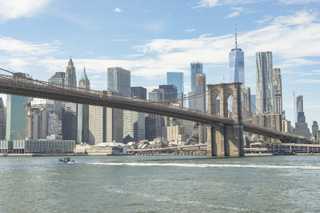 View of the Brooklyn bridge over the Hudson river with skyline of Lower Manhattan in New York City, USA.のeditorial素材