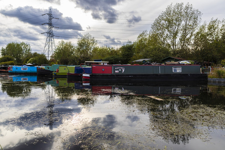 London, United Kingdom - September 15, 2018: View of houseboats docked on the river Thames alongside the Lea Valley Walk.のeditorial素材