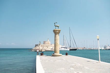 Rhodes, Greece - August 4, 2018: View of the iconic Colossus of Rhodes in the harbour of the city.のeditorial素材