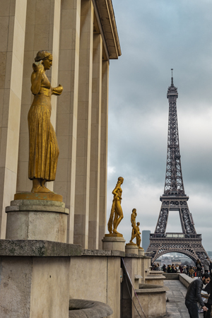 Paris, France - January 27, 2018: View of the iconic French landmark Eiffel Tower from the Trocadero place with statues in the city of Paris, France.のeditorial素材