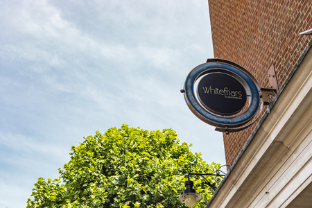 Canterbury, England - June 24, 2018: Street sign of Whitefriars Canterbury indicating the area of the biggest shopping centre in East Kent.のeditorial素材