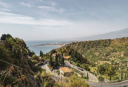 Taormina Sicily, Italy - July 9 2019: Landscape view of the curvy roads through the hills of Taormina in Sicily Italyのeditorial素材