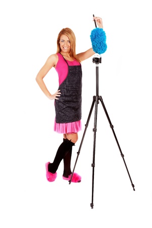 Portrait of a beautiful young woman cleaning cameraの写真素材