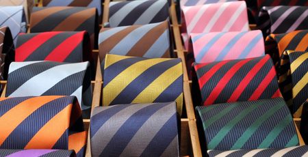 italian striped colorful silk ties for sale の写真素材