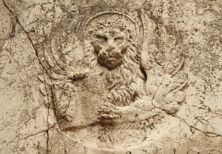 antique winged lion relief in marble, Venice の写真素材
