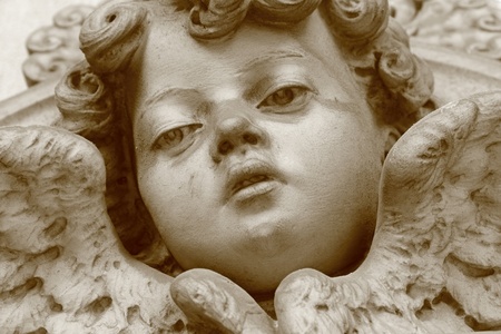 angelic face, cemetery sculpture