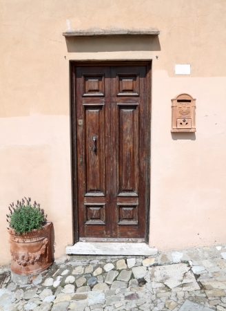front door with elegant details in Tuscany, Italy, Europeの写真素材