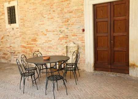 retro garden furniture on italian terrace, Italy, Europeの写真素材