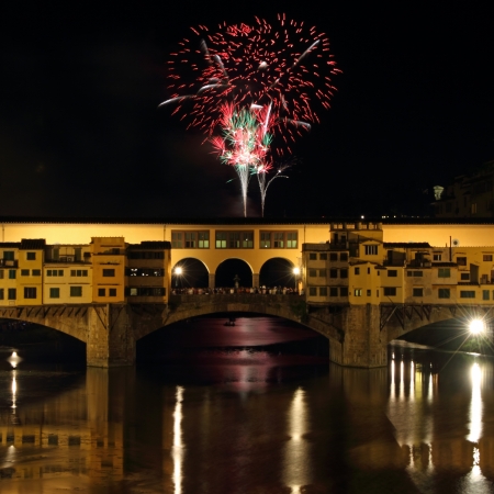 Fireworks over Arno river and Ponte Vecchio on San Giovanni feast, 24th of  June, Florence, Tuscany, Italy, Europeのeditorial素材