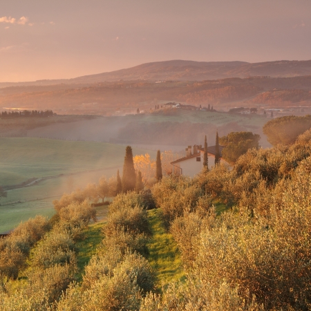 Sunrise in fantastic tuscan landscape with morning mist, Tuscany, Italy, Europeの写真素材