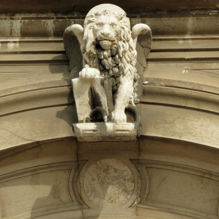 detail of ornamental antique facade with venetian lion figure, Venice, Italyの写真素材