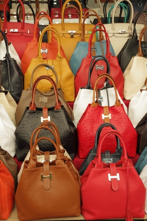 colorful elegant leather hand bags collection on Mercato di San Lorenzo   Mercato Centrale   in Florence, Italy, Europeのeditorial素材