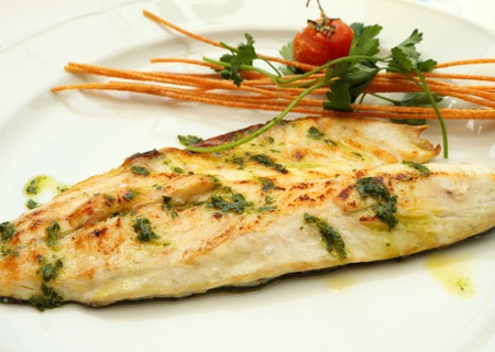 Grilled sea bass Fish Fillet plate ,serving in italian restaurant