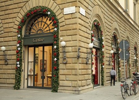 Florence - DEC 6: Boutique Cartier at Strozzi street  decorated for Christmas on December 6, 2013 in Florence,Italy. Cartier company, well known for its jewelry and watches, was found in 1847 .のeditorial素材
