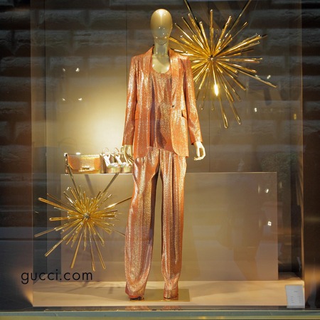 FLORENCE, ITALY - DEC 5: Gucci boutique in Florence on famous for luxury shopping Tornabuoni street on December, 5, 2013. Gucci was founded by Guccio Gucci in Florence in 1921.のeditorial素材