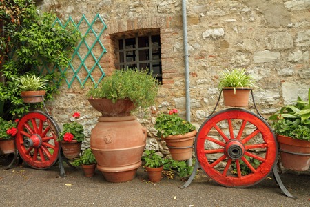 fancy country backyard with many planters with flowers , Tuscany,Italy, Europeの写真素材
