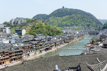 HUNAN, CHINA - April 14 : Old houses in Fenghuang county on Apr 14, 2015 in Hunan, China. The ancient town of Fenghuang was added to the UNESCO World Heritage Tentative List in the Cultural category.のeditorial素材