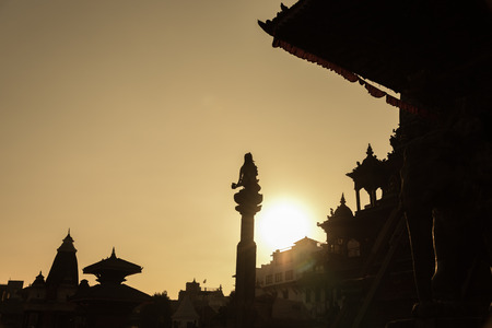 silhouette of old town in Nepal with lensflareの写真素材