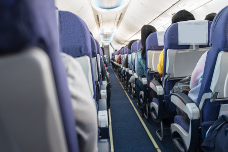 The interior of the aircraft with passengers, flewの写真素材