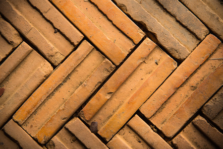 Old red pattern of brick wall background and textureの写真素材
