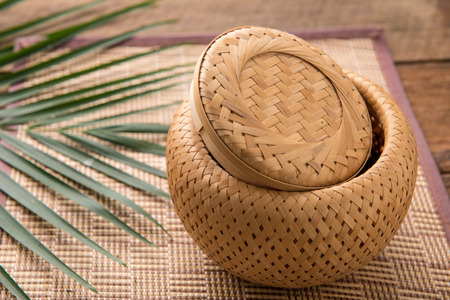 Sticky rice box,be the light while,member northeast in which,the aborigine in northeastern area of Thailand adds sticky rice steams cooked for already induce to eat.の写真素材