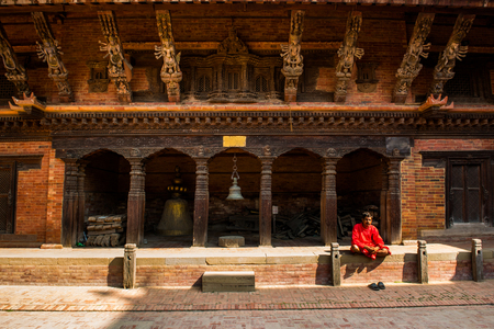 Kathmandu,Nepal -October 16,2018 : unidentified man besides the street of Patan, Nepal .Patan is best known for its rich cultural heritage, expecially its arts and crafts.のeditorial素材