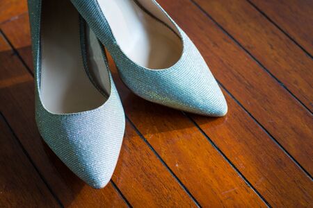 fashion bridal wedding high heeled shoes decorated on  glamour modern accessory background.の写真素材