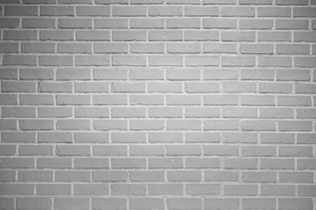 Abstract weathered texture stained old stucco light gray and aged paint white brick wall background in rural room, grungy rusty blocks of stonework technology color horizontal architecture wallpaperの写真素材