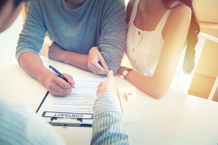 Meeting with agent in office, buying renting apartment or house, buyers of real estate ready to...