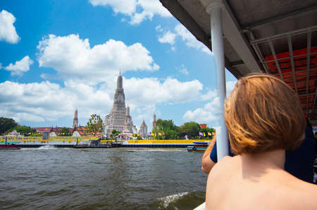 Bangkok,Thailand - March 10 2020 : Passengers and traveller on transportation boat move to War Arun...