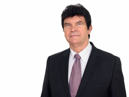 Studio shot of mature Caucasian businessman isolated against white backgroundの写真素材