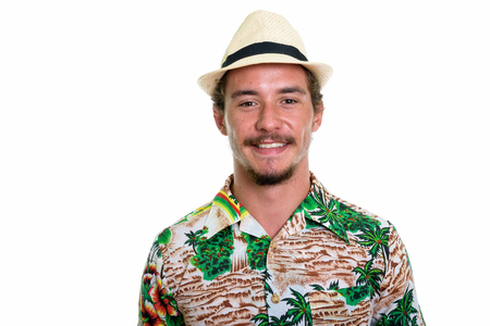 Close up of young happy tourist man smiling isolated against whiの写真素材