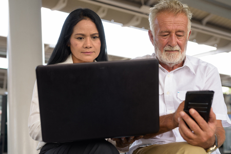 Mature multi-ethnic couple happy and in love while exploring theの写真素材