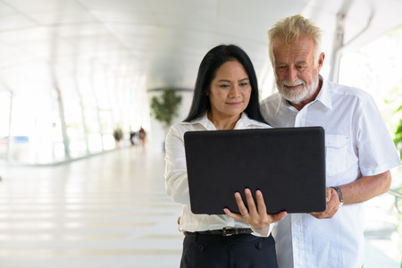Mature multi-ethnic couple happy and in love while exploring theの写真素材