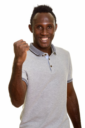 Young happy African man smiling and looking motivatedの写真素材