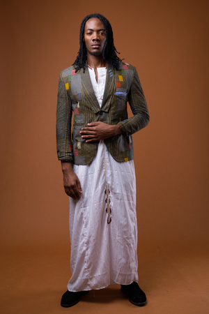 Young handsome African man wearing traditional clothesの写真素材