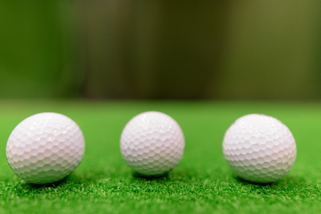 Golf Balls On Green Surfaceの写真素材