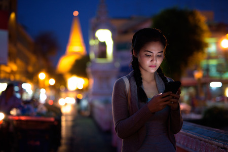 Young beautiful Asian tourist woman exploring Nakhon Pathom provの写真素材