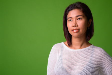 Young Asian woman thinking