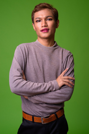 Androgynous young Asian man wearing makeupの写真素材