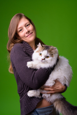 Young beautiful woman wearing warm clothingの写真素材