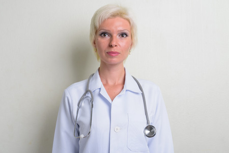 Beautiful blonde woman doctor with short hairの写真素材
