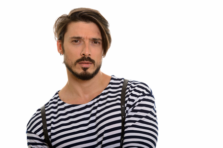 Studio shot of handsome man against white backgroundの写真素材