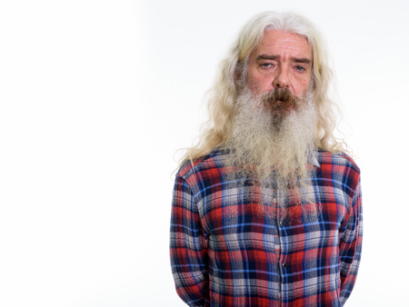 Studio shot of senior bearded man with gray beard and long hairの写真素材